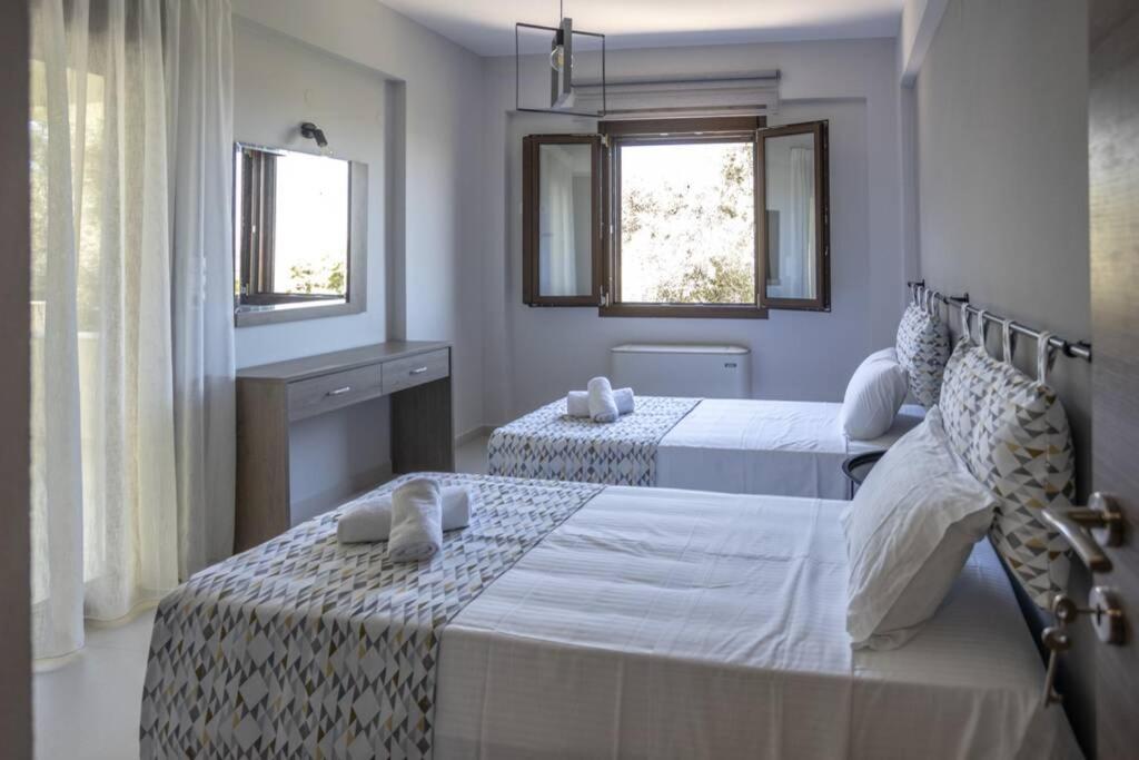 Mela Luxury Apartments Maroulás Eksteriør bilde