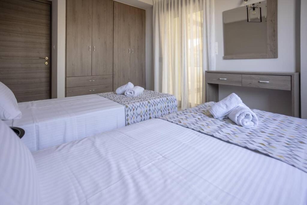Mela Luxury Apartments Maroulás Eksteriør bilde