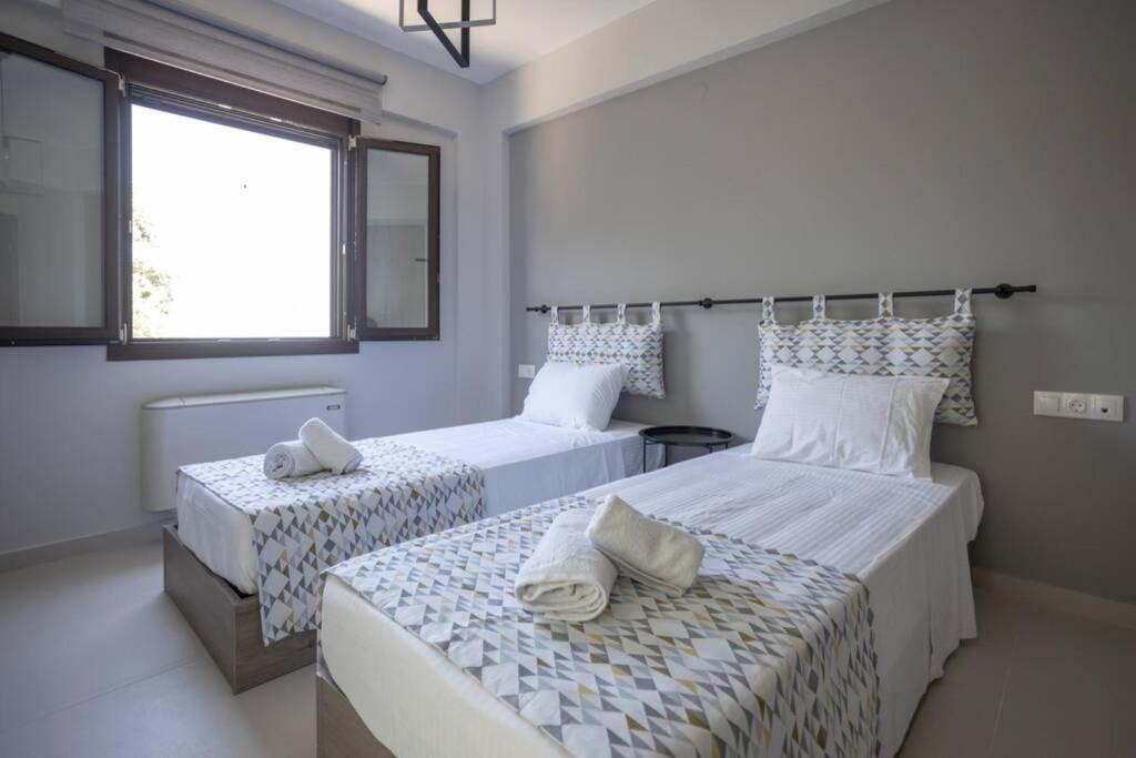 Mela Luxury Apartments Maroulás Eksteriør bilde